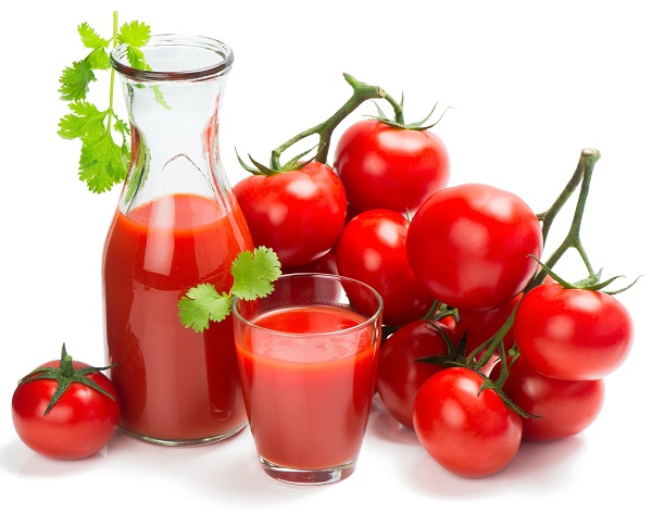 tomatoes and tomato juice on white background